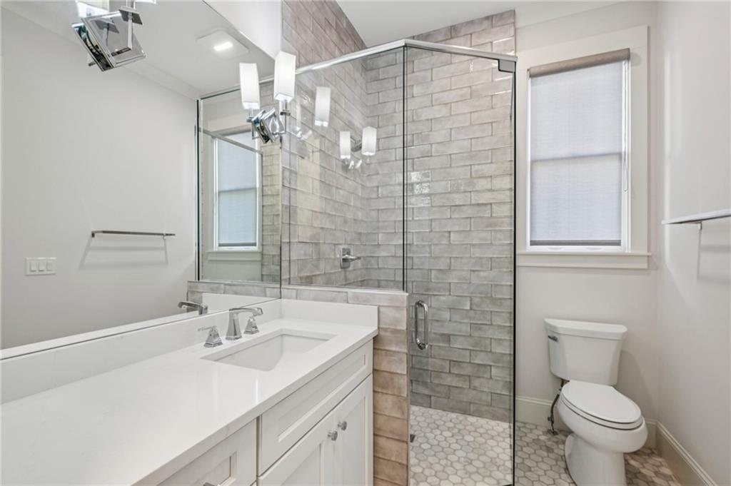 216 Haralson Lane Atlanta, GA 30307 - Photo 25 of 48 a bathroom with a sink toilet and shower