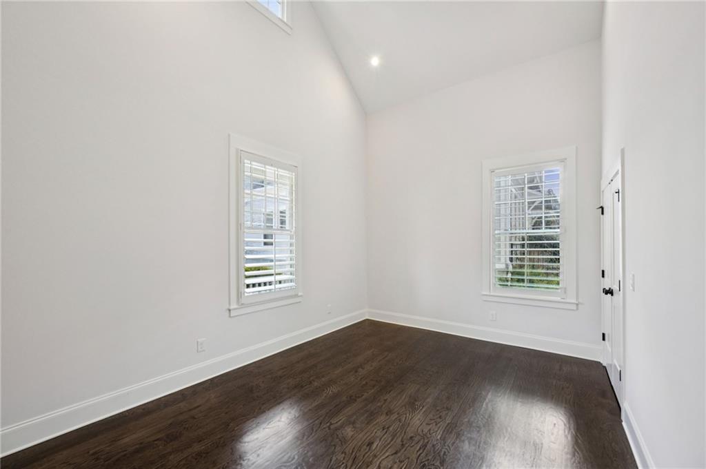 216 Haralson Lane Atlanta, GA 30307 - Photo 27 of 48 an empty room with wooden floor and windows