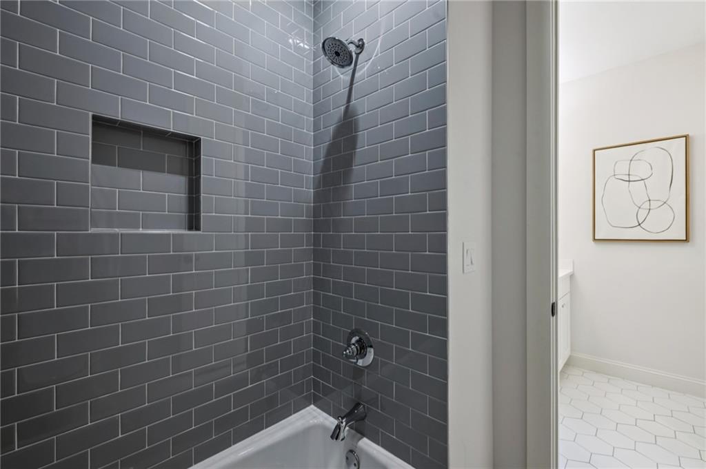 216 Haralson Lane Atlanta, GA 30307 - Photo 31 of 48 a bathroom with a shower