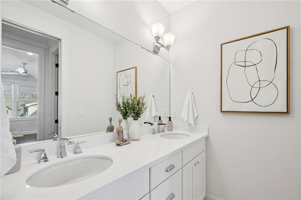 216 Haralson Lane Atlanta, GA 30307 - Photo 33 of 48 a bathroom with a sink and a mirror