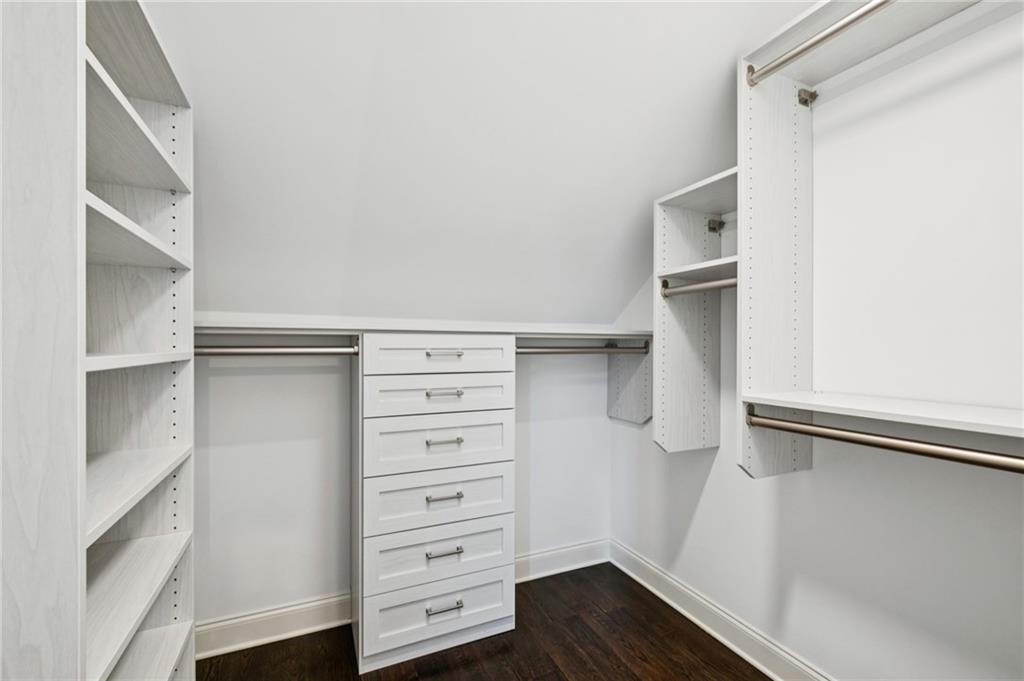 216 Haralson Lane Atlanta, GA 30307 - Photo 36 of 48 a view of walk in closet with empty racks