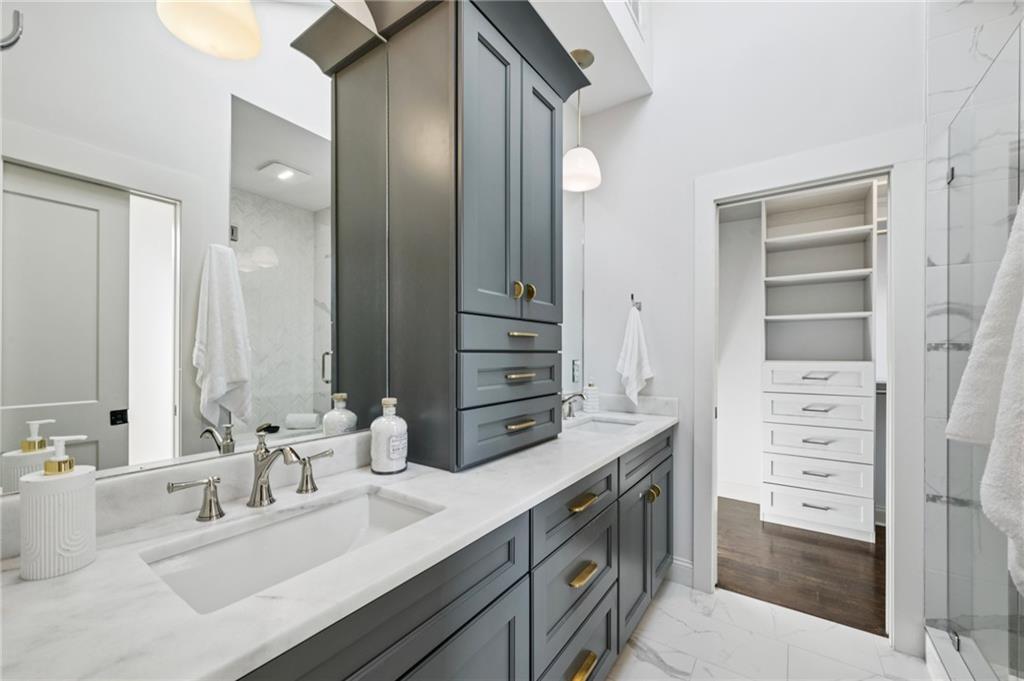 216 Haralson Lane Atlanta, GA 30307 - Photo 37 of 48 a bathroom with a double vanity sink mirror and double