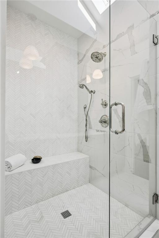 216 Haralson Lane Atlanta, GA 30307 - Photo 40 of 48 a bathroom with a bathtub and shower