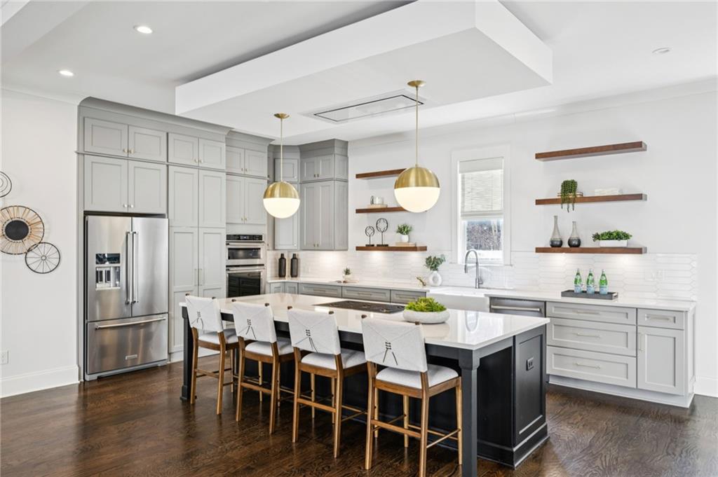 216 Haralson Lane Atlanta, GA 30307 - Photo 7 of 48 a kitchen that has a table and chairs in it