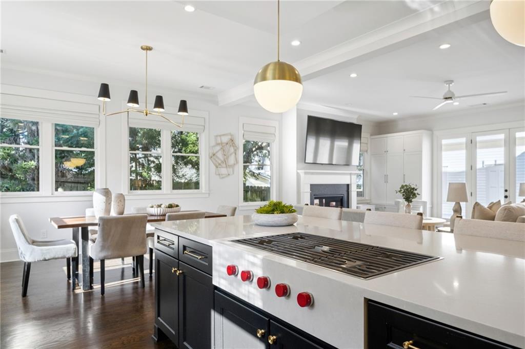 216 Haralson Lane Atlanta, GA 30307 - Photo 10 of 48 a kitchen that has a stove a table and chairs in it