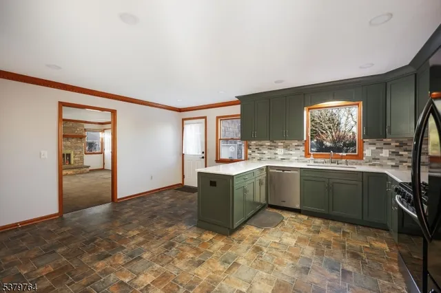 a aerial view of a house with a yard