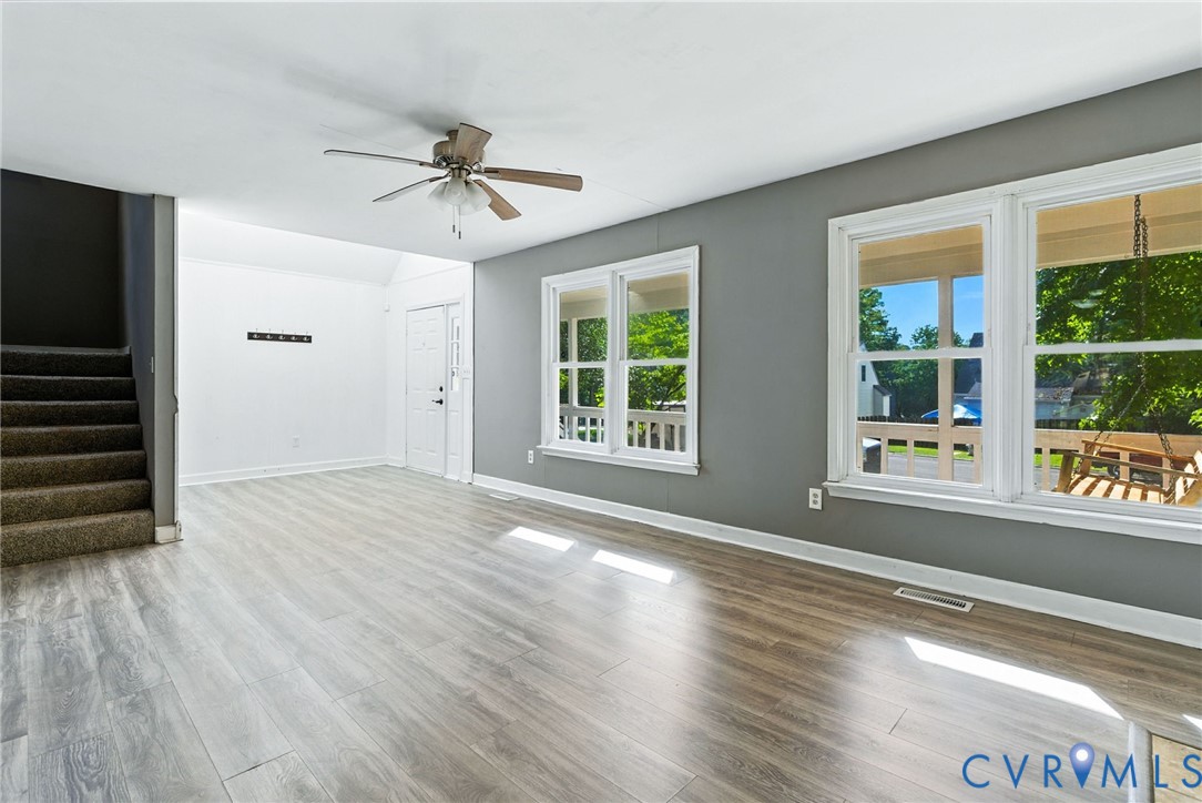 7705 Offshore Drive Chesterfield, VA 23832 - Photo 15 of 39 a view of an empty room with wooden floor and a window