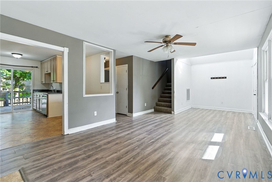 7705 Offshore Drive Chesterfield, VA 23832 - Photo 16 of 39 a view of a livingroom with wooden floor and stairs