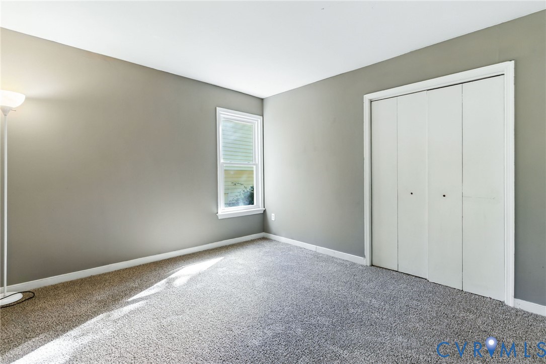 7705 Offshore Drive Chesterfield, VA 23832 - Photo 23 of 39 an empty room with windows and closet