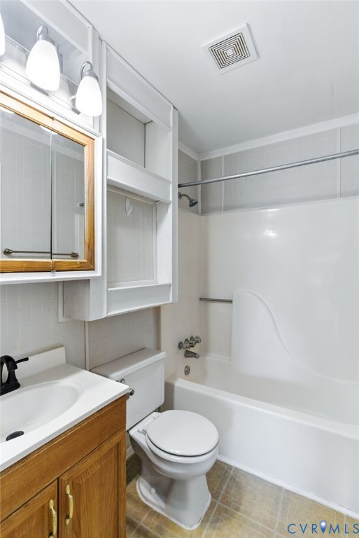 7705 Offshore Drive Chesterfield, VA 23832 - Photo 24 of 39 a bathroom with a sink toilet vanity and bathtub