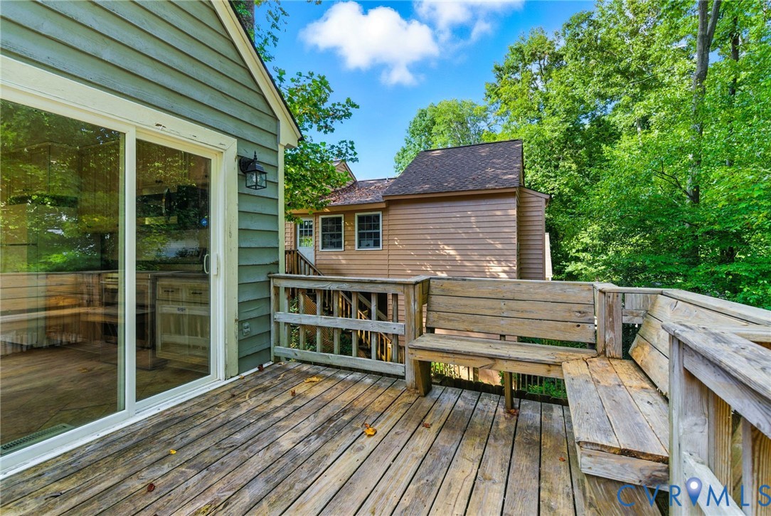 7705 Offshore Drive Chesterfield, VA 23832 - Photo 35 of 39 a view of a wooden deck with a yard