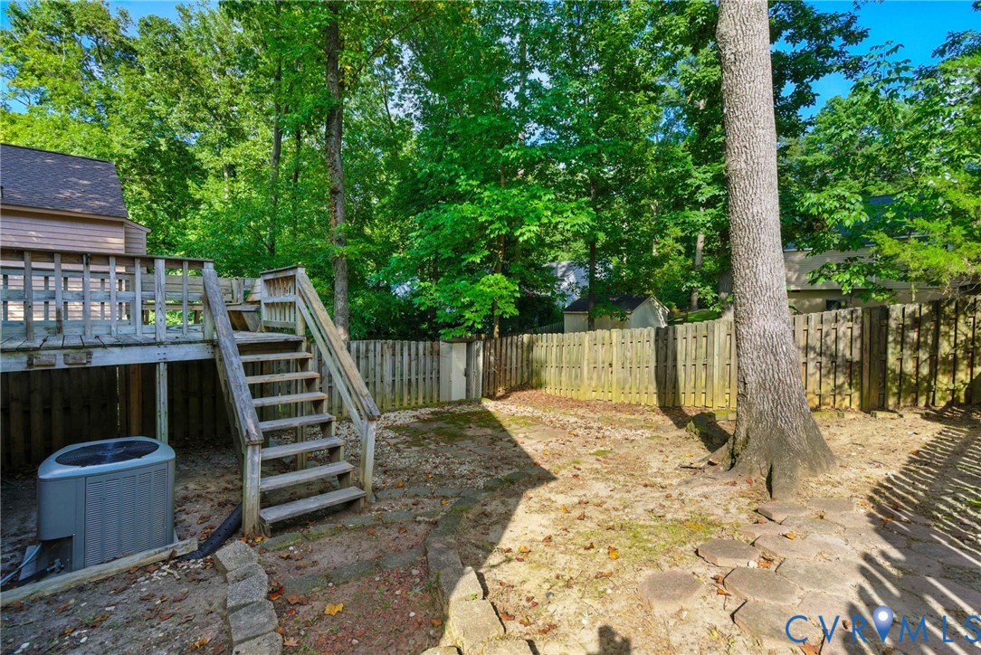 7705 Offshore Drive Chesterfield, VA 23832 - Photo 38 of 39 a view of a backyard with a deck