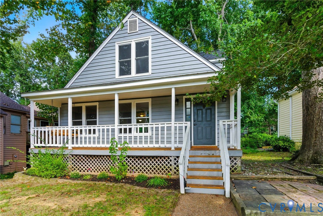 7705 Offshore Drive Chesterfield, VA 23832 - Photo 4 of 39 a front view of a house with a garden