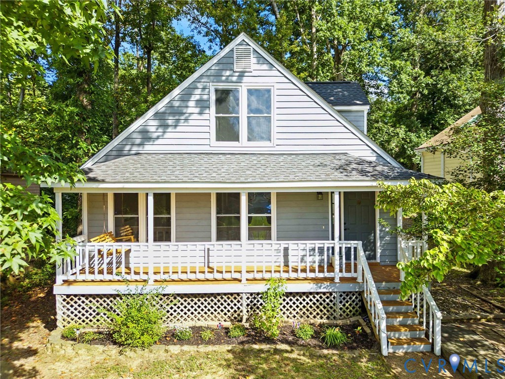 7705 Offshore Drive Chesterfield, VA 23832 - Photo 6 of 39 a front view of a house with a yard