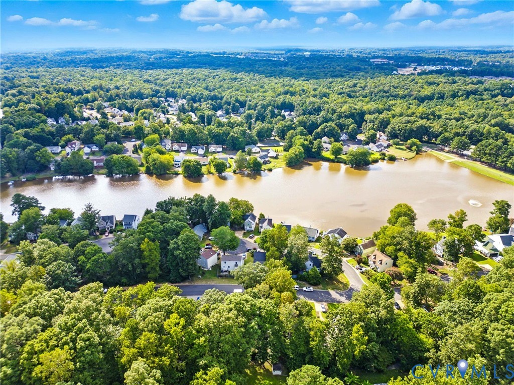 7705 Offshore Drive Chesterfield, VA 23832 - Photo 7 of 39 a view of a lake with a city