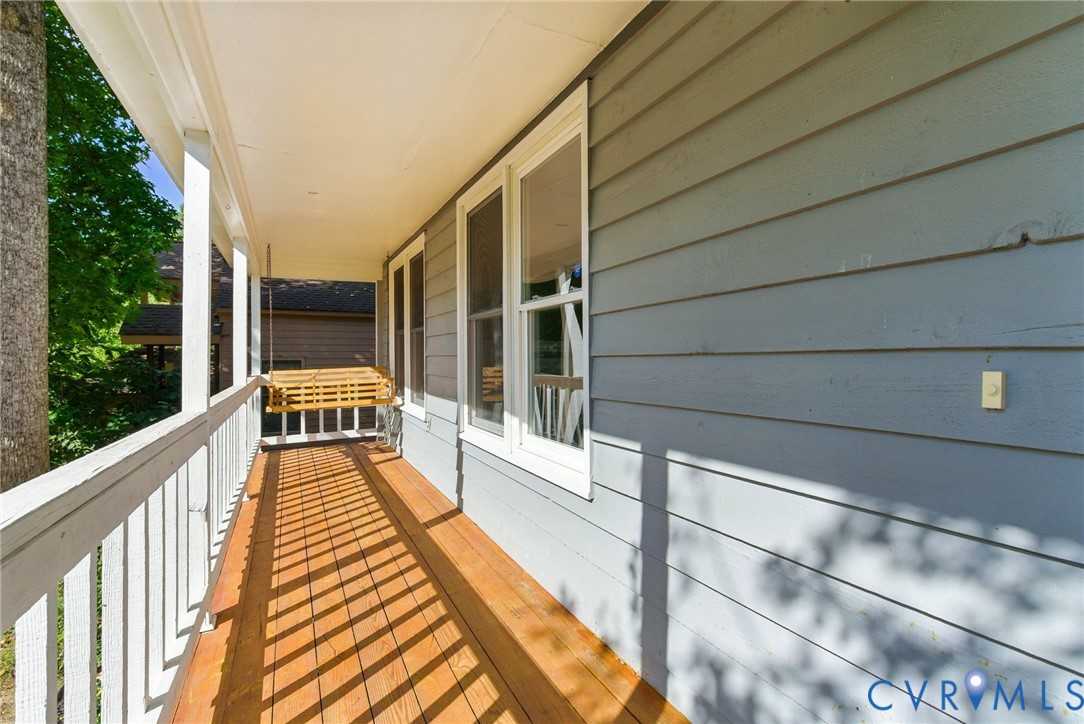 7705 Offshore Drive Chesterfield, VA 23832 - Photo 9 of 39 a view of balcony with wooden floor and seating space