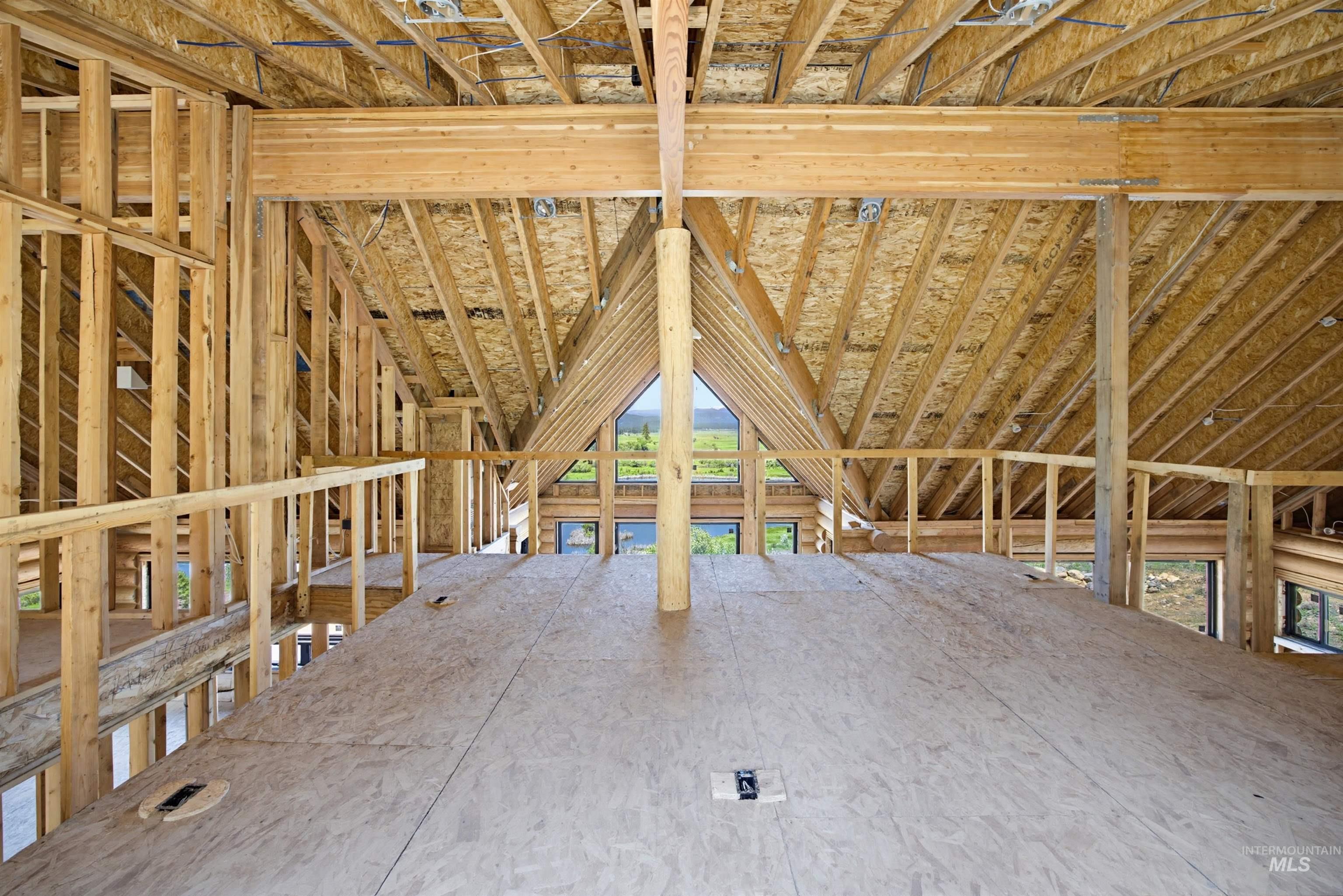3322 Big Creek Road New Meadows, ID 83654 - Photo 50 of 50 Vaulted ceiling structure with exposed wooden beams and a spacious upper-level floor plan