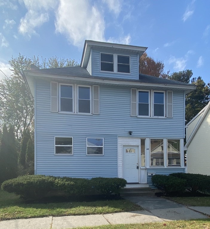 48 Boyer Street Springfield, MA 01109 - Photo 1 of 30 a front view of a house with a yard