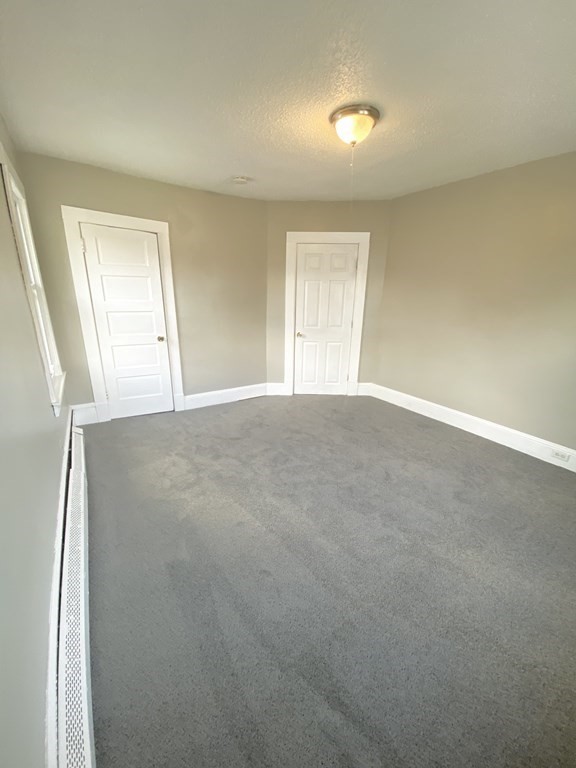 48 Boyer Street Springfield, MA 01109 - Photo 15 of 30 a view of an empty room and window