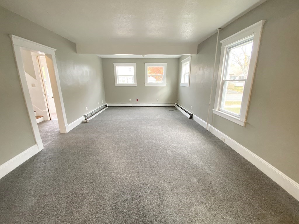 48 Boyer Street Springfield, MA 01109 - Photo 16 of 30 an empty room with windows and closet