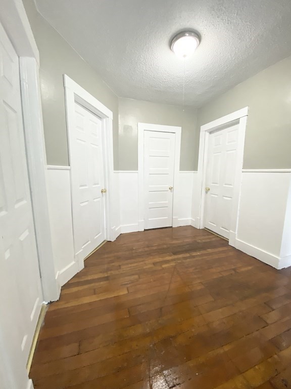 48 Boyer Street Springfield, MA 01109 - Photo 7 of 30 a bedroom with a bed and a window
