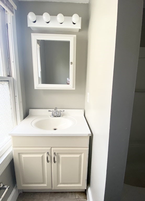 48 Boyer Street Springfield, MA 01109 - Photo 10 of 30 a close view of a sink a washer and dryer