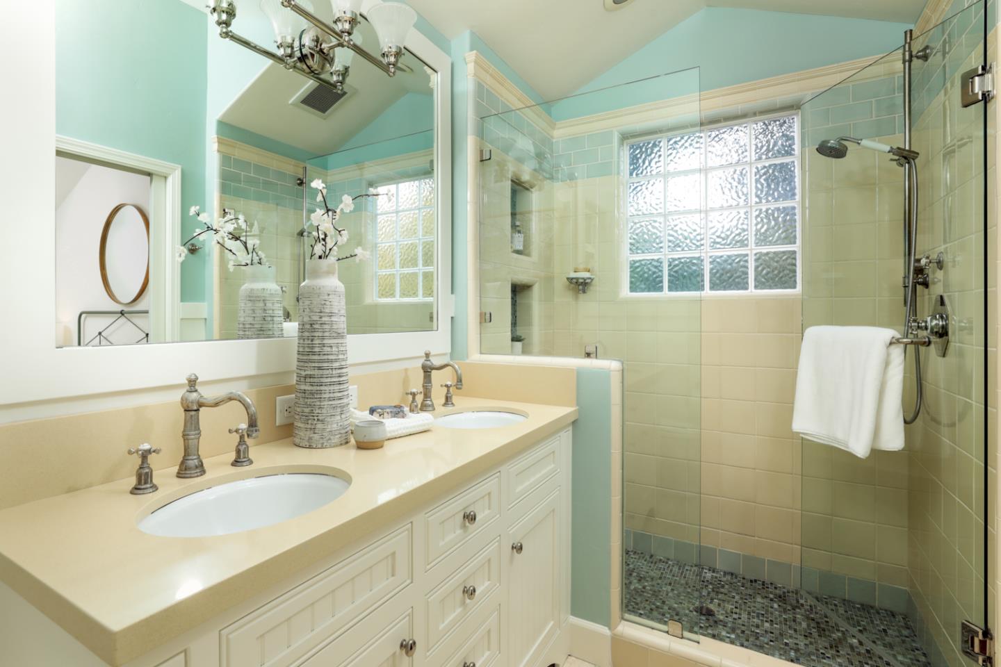 732 Laurel Avenue Menlo Park, CA 94025 - Photo 15 of 22 a bathroom with a double vanity sink mirror and shower