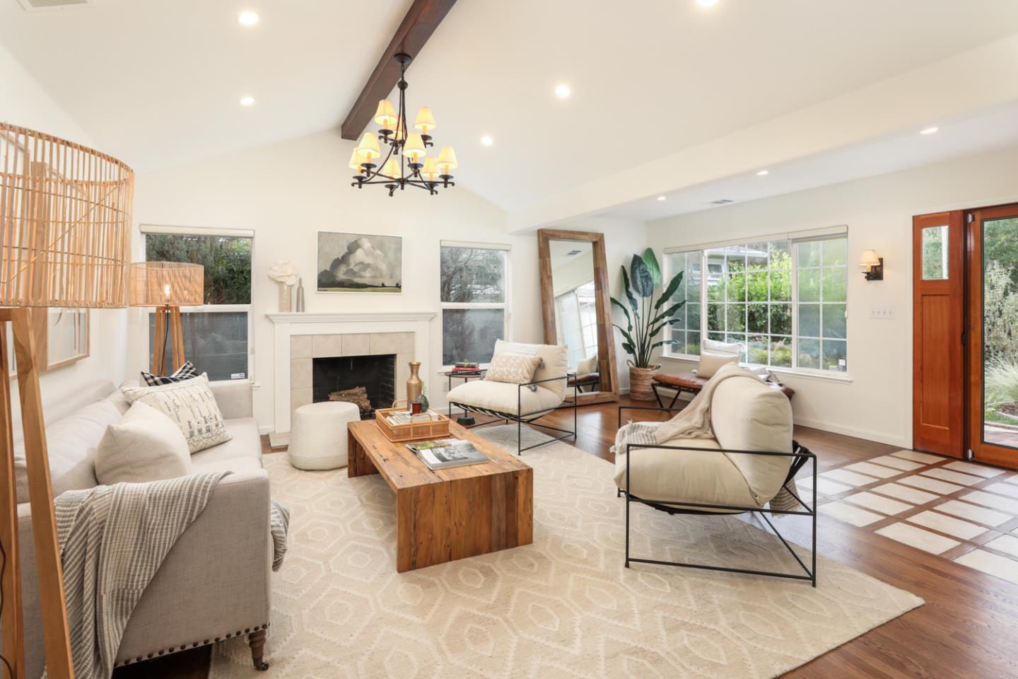 732 Laurel Avenue Menlo Park, CA 94025 - Photo 4 of 22 a living room with furniture fireplace and large windows