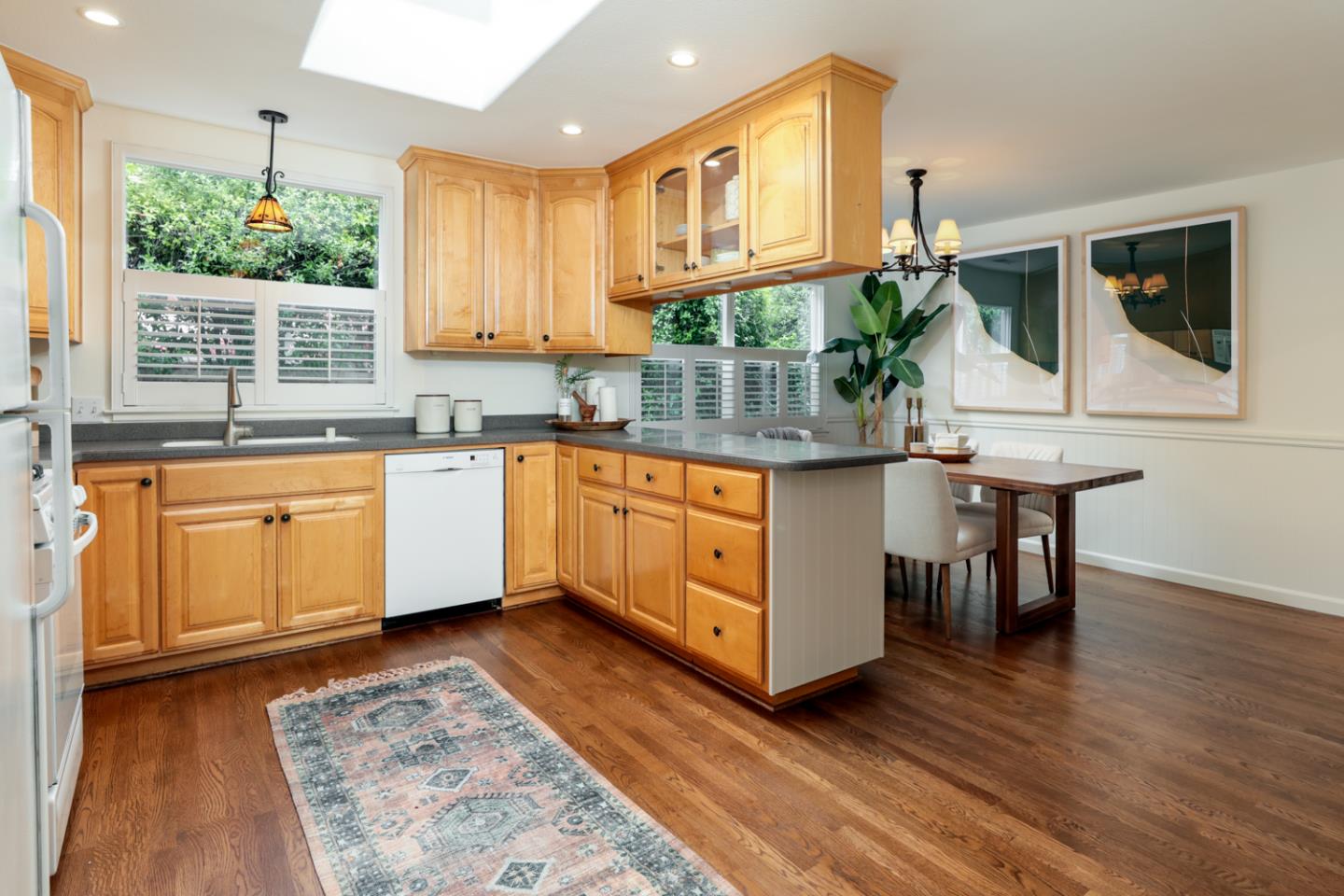 732 Laurel Avenue Menlo Park, CA 94025 - Photo 7 of 22 a kitchen with a sink and cabinets