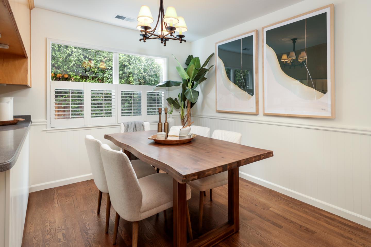732 Laurel Avenue Menlo Park, CA 94025 - Photo 8 of 22 a view of a dining room with furniture window and wooden floor