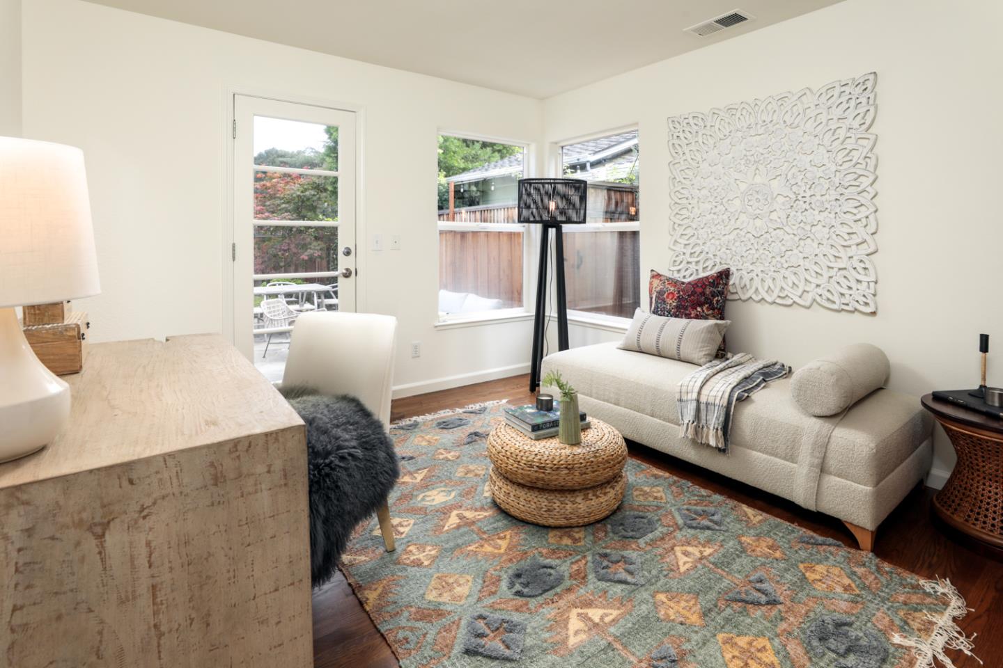 732 Laurel Avenue Menlo Park, CA 94025 - Photo 10 of 22 a living room with furniture and a large window
