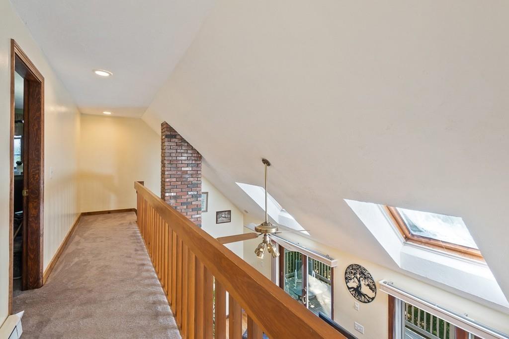 63 Russell Hill Road Ashburnham, MA 01430 - Photo 17 of 30 a view of a hallway with staircase