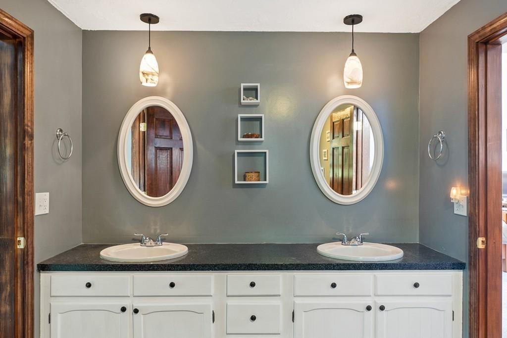 63 Russell Hill Road Ashburnham, MA 01430 - Photo 21 of 30 a bathroom with a sink and a mirror