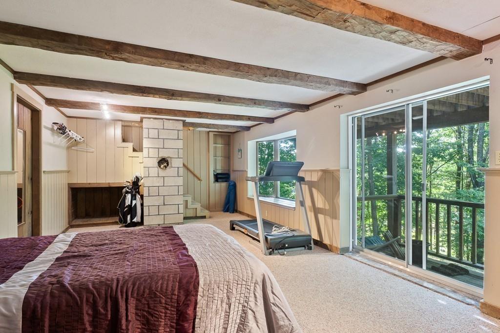 63 Russell Hill Road Ashburnham, MA 01430 - Photo 25 of 30 a bedroom with a bed and a large window