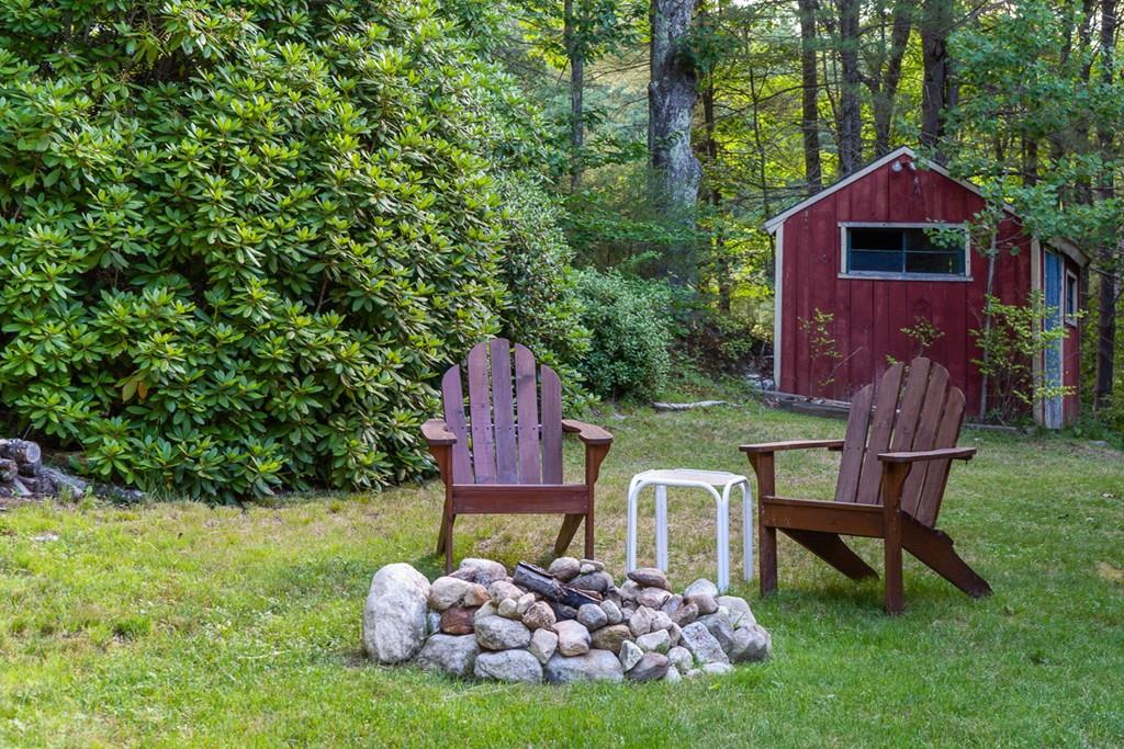 63 Russell Hill Road Ashburnham, MA 01430 - Photo 30 of 30 a view of a two chairs in a yard