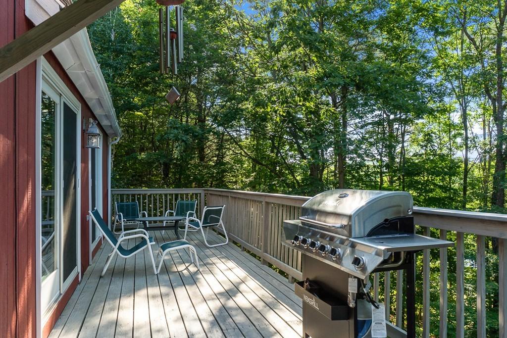 63 Russell Hill Road Ashburnham, MA 01430 - Photo 4 of 30 a view of balcony with furniture and trees