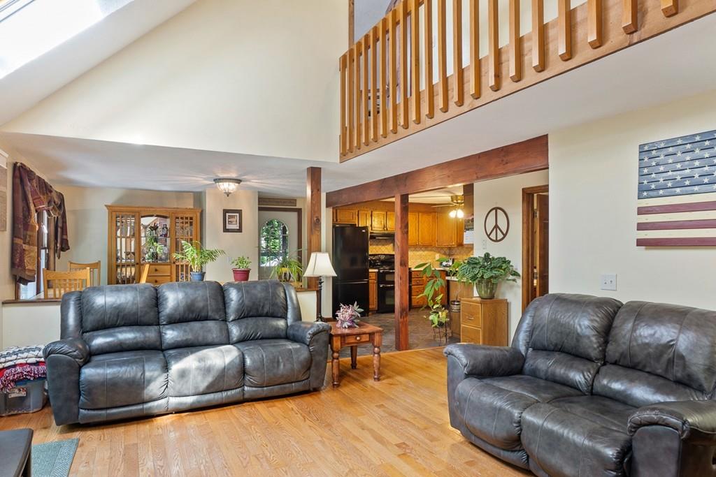 63 Russell Hill Road Ashburnham, MA 01430 - Photo 9 of 30 a living room with furniture and a large window
