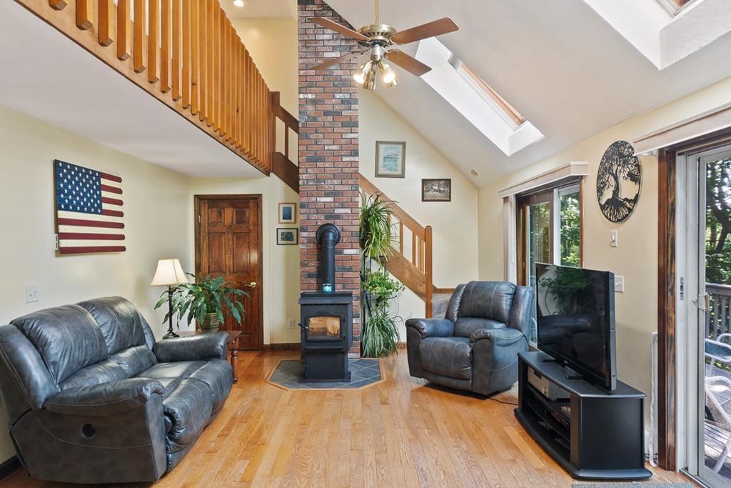 63 Russell Hill Road Ashburnham, MA 01430 - Photo 10 of 30 a living room with furniture and a flat screen tv