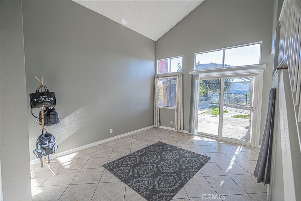 28076 Wildwind Road Canyon Country, CA 91351 - Photo 4 of 48 a view of empty room with windows