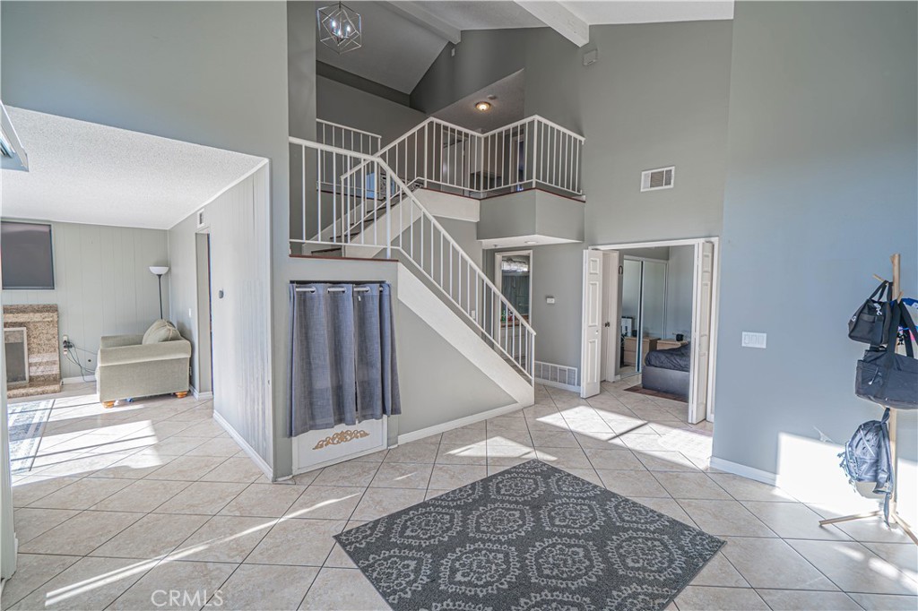 28076 Wildwind Road Canyon Country, CA 91351 - Photo 5 of 48 a view of entryway and hall with wooden floor