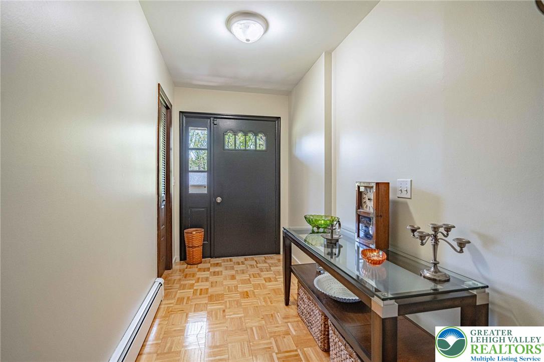 3857 Friedens Road Slatington, PA 18080 - Photo 15 of 75 Enter into a bright and welcoming space featuring a durable, patterned floor.
