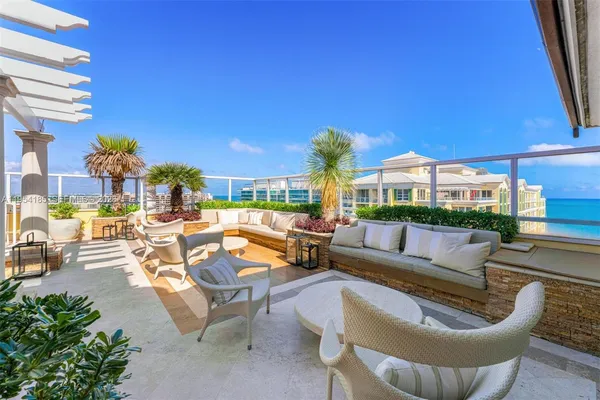 a outdoor space with patio couch and outdoor seating