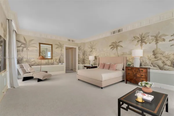 a bedroom with furniture and a couch