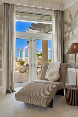 a bedroom with a bed and a mirror