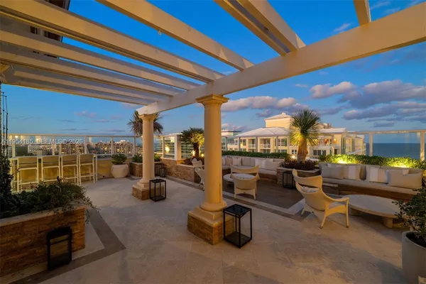 a room with gym equipment and a view of living room