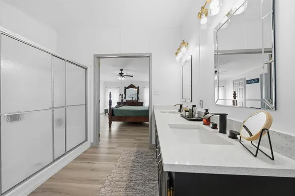 a view of a living room and bathroom