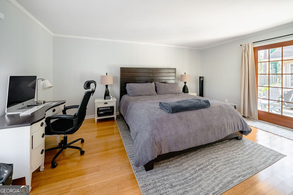 115 Devilla Trace Fayetteville, GA 30214 - Photo 17 of 30 a bedroom with a bed a desk and chair