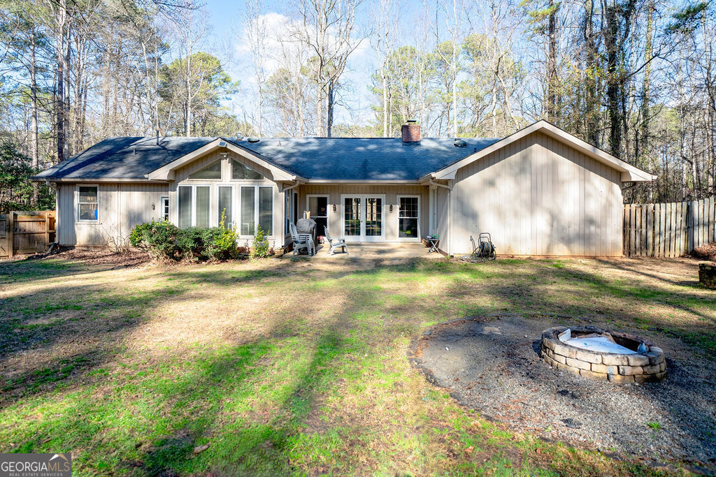 115 Devilla Trace Fayetteville, GA 30214 - Photo 27 of 30 a front view of a house with garden