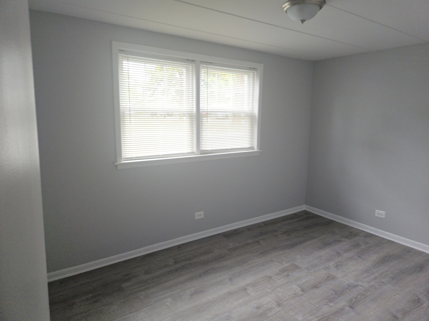 446 North Ardmore Avenue, Unit GB Villa Park, IL 60181 - Photo 9 of 9 an empty room with a window