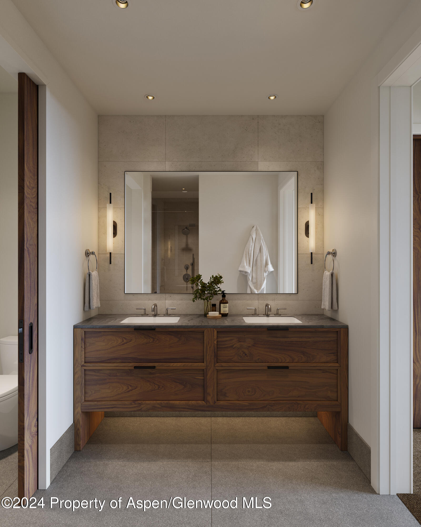 221 Wood Road, Unit 306 Snowmass Village, CO 81615 - Photo 4 of 9 a view of mirror light fixtures and entryway